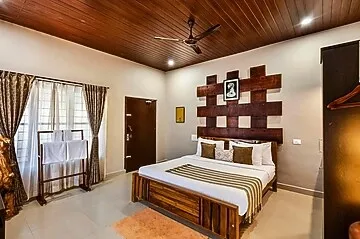 hotel near coorg railway station - alaya stay twisted tree together 2bhk villa with pool & restaurant