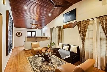 hotel with party hall in virajpet, coorg - alaya stays twisted tree 1 room with pool & restaurant
