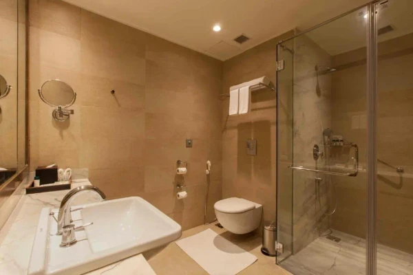 hotel with swimming pool in ramnagar, jim corbett - lemon tree premier corbett