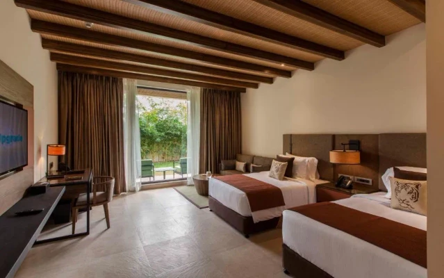 hotel with party hall in ramnagar, jim corbett - lemon tree premier corbett