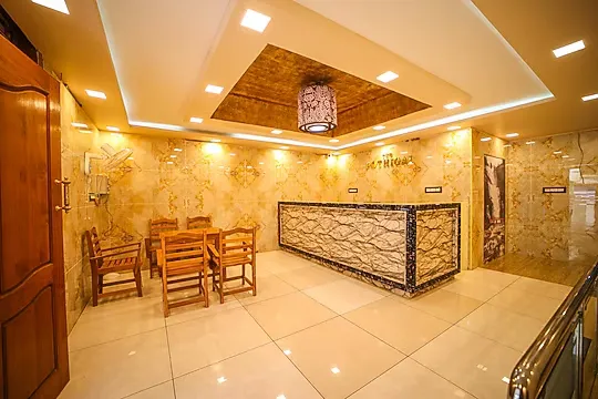 hotel near courtallam railway station - the pothigai palace