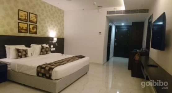 hotel with free parking in kuvempu nagar, davanagere - mango hotel naveen davangere