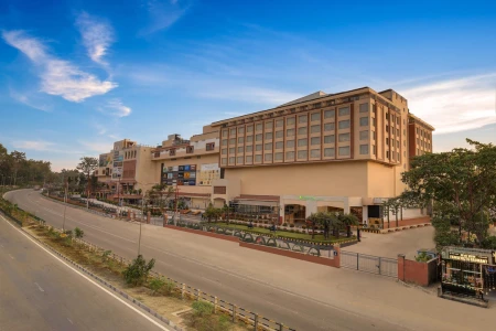 hotel with swimming pool in bhagwantpur, dehradun - lemon tree hotel mall of dehradun