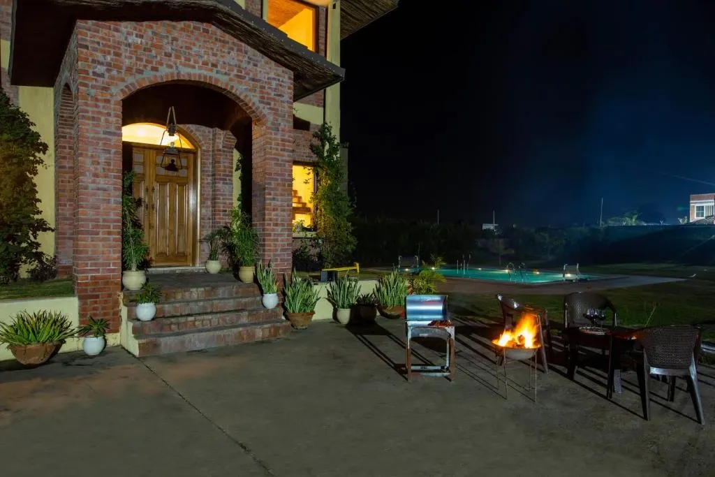 family hotel with pool in chattarpur, delhi - alaya stays crystal 3 bhk farm house