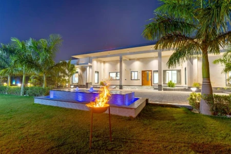 hotel with gym in palla, delhi - elivaas levante farms 5 bhk villa with pvt pool and garden