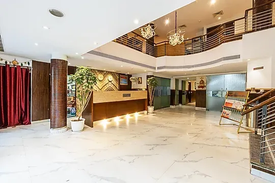 hotel with free parking in kapashera, delhi - hotel arch plaza