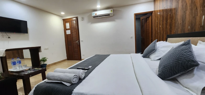 hotel with gym in khanpur, delhi - hotel crystal residency