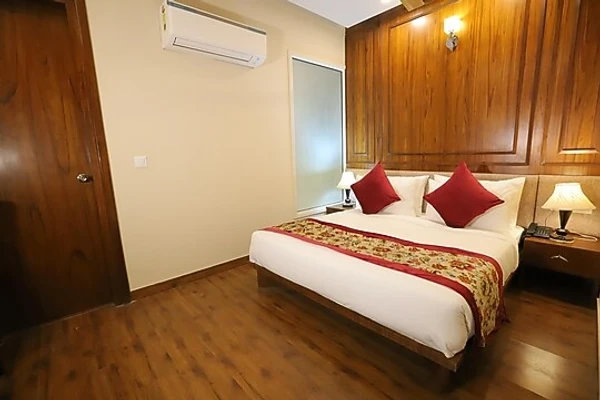 hotel with swimming pool in anand vihar, delhi - ip royal by qotel a luxury hotel laxmi nagar