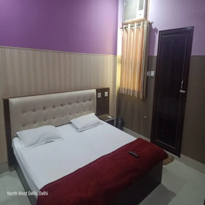hotel with gym in jeewan nagar, delhi - lotus guest house