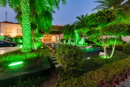 hotel with gym in bankoli village, delhi - palm green hotel