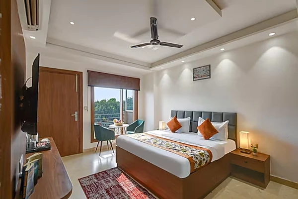 hotel with swimming pool in ashok vihar, delhi - qotel comfort ashok vihar