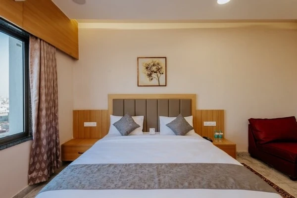hotel with meeting room in dwarka bus station, dwarka - daksh the grand goverdhan