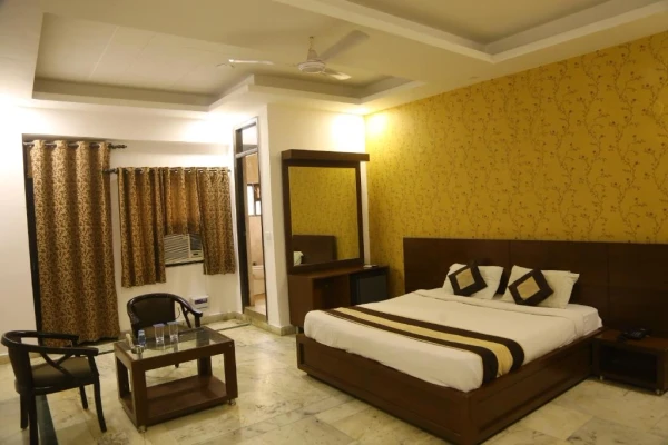 hotel with free parking in sector 28, faridabad - rockwood inn