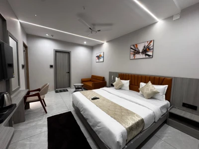 hotel with free parking in uvarsad, gandhinagar - hotel legenta