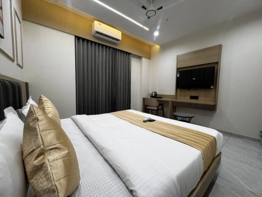 hotel room booking in uvarsad, gandhinagar - hotel legenta