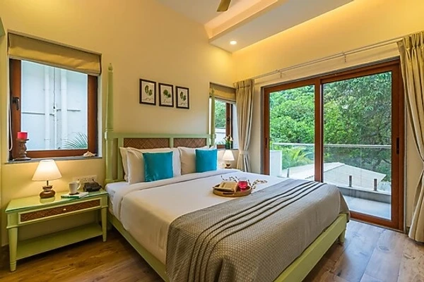 hotel with swimming pool in siolim, goa - azalea pet-friendly 3-bhk villa with private pool, garden & bar siolim goa
