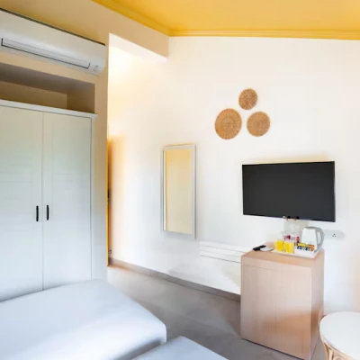 hotel with bar in arpora, goa - bloom boutique  baga