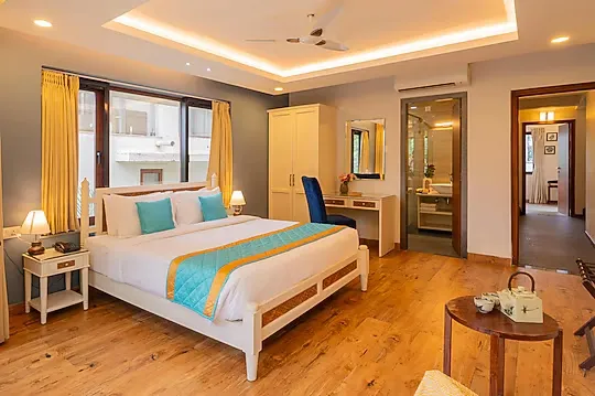 family hotel with pool in marna siolim, goa - elivaas anasa 4 bhk with pvt pool & outdoor sitting area