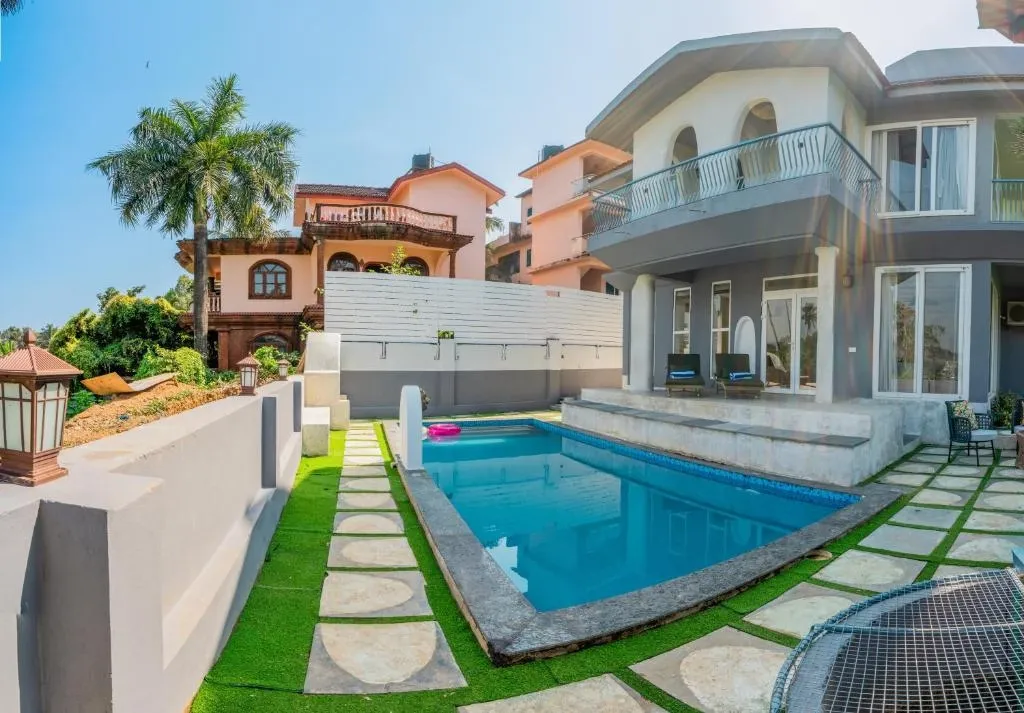 hotel room booking in candolim, goa - elivaas casa mandala 4bhk villa with pvt pool and garden
