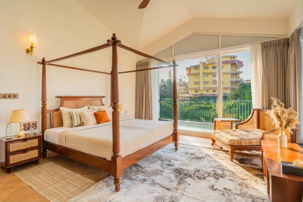 hotel with bar in candolim, goa - elivaas casa mandala 4bhk villa with pvt pool and garden