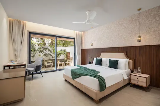 hotel with free parking in vagator, goa - elivaas cloud 7 waves 4 bhk with private  pool vagator