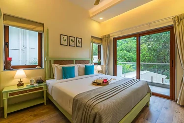 hotel in marna siolim, goa for family - elivaas judiline villa 3 bhk with pool & bar