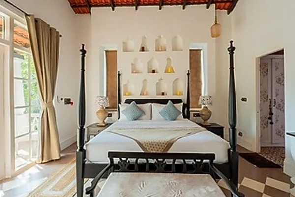 family hotel with pool in siolim, goa - elivaas maison 10 luxe 4 bhk villa with pvt pool, garden & portuguese charm siolim