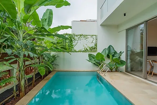 hotel with banquet hall in vagator, goa - elivaas mirai gemini 3 bhk with private pool  vagator