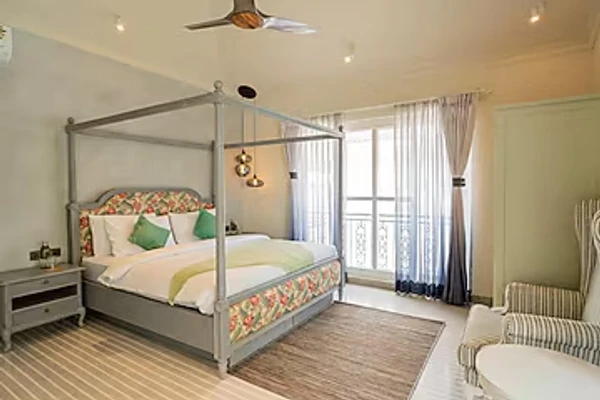 hotel in assagao, goa for family - elivaas purple coral luxe 5-bhk villa with two pvt pools chapora fort