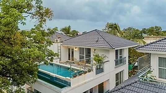 hotel with party hall in assagao, goa - elivaas purple coral luxe 5-bhk villa with two pvt pools chapora fort