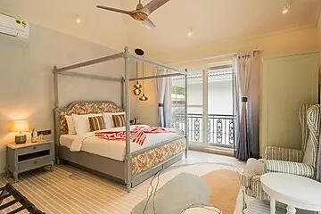 hotel with bar in assagao, goa - elivaas purple coral luxe 5-bhk villa with two pvt pools chapora fort