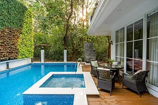 assagao, goa hotel booking - elivaas suntuarios casa ikkebana 4 bhk with private pool vagator