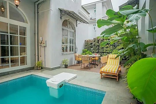 hotel with party hall in calangute beach, goa - elivaas vacasa villa 5 bhk pet friendly with pvt pool