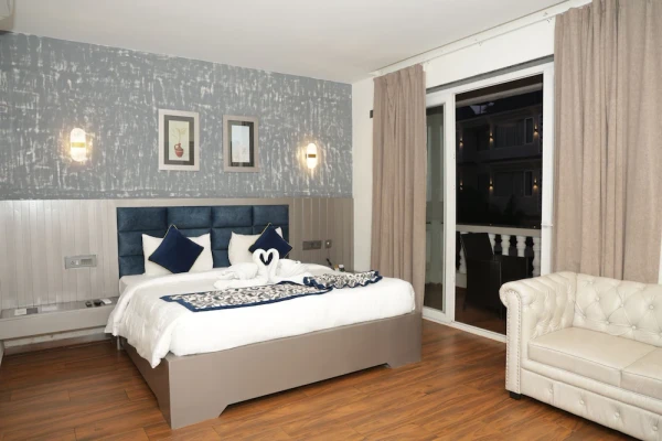 hotel with swimming pool in anjuna, goa - grand continent, anjuna - a sarovar portico affiliate hotel