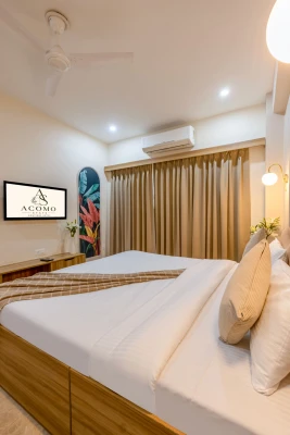 hotel near gurugram railway station - acomo stays