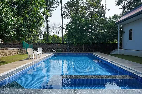 hotel with gym in ambience mall, gurugram - alaya stays ashirwad farms 5 bhk pet friendly with pvt pool