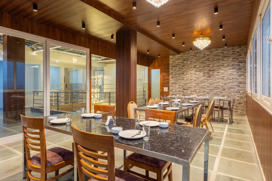 hotel with party hall in sector 53, gurugram - cozy stays