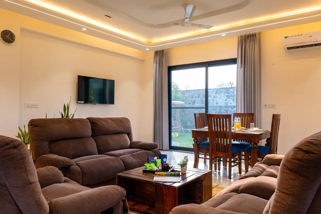 hotel with gym in sohna road, gurugram - elivaas prassanam vatika 2 bhk hillside villa with private pool