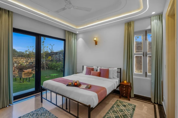 hotel room booking in sohna road, gurugram - elivaas prassanam vatika 2 bhk hillside villa with private pool