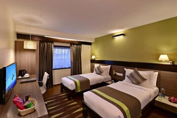 hotel with swimming pool in sector 14, gurugram - quality inn gurugram
