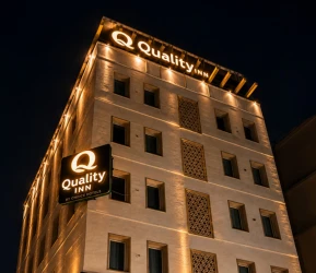 hotel with swimming pool in sector 14, gurugram - quality inn gurugram