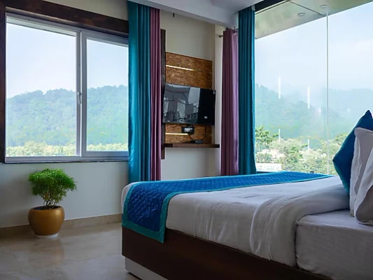 hotel with gym in fatehpur, haldwani - trevon the shire inn