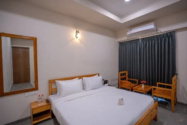 hotel with swimming pool in navagam, halol - daksh the nirvana retreat