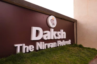 hotel with party hall in navagam, halol - daksh the nirvana retreat