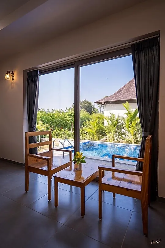 hotel with swimming pool in navagam, halol - daksh the nirvana retreat