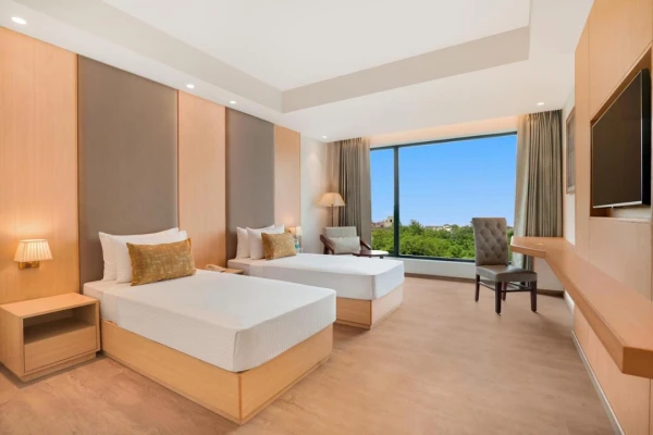 hotel with swimming pool in naya gaon, haridwar - lemon tree hotel haridwar