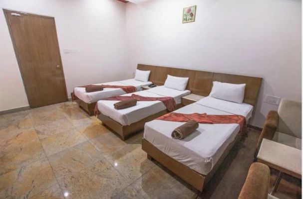 hotel with free parking in bm road, hassan - hotel tokyo