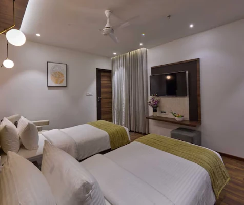 hotel near hosur railway station - grand continent, hosur - a sarovar portico affiliate hotel