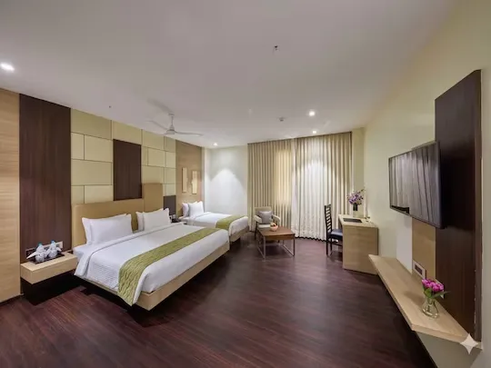 family hotel with pool in seetharam nagar, hosur - grand continent, hosur - a sarovar portico affiliate hotel
