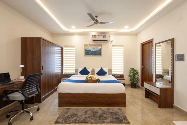 hotel with party hall in madhapur, hyderabad - elysium studio suites